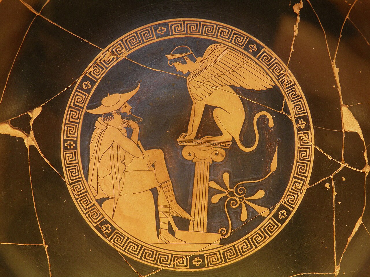 A man tries to solve the famous riddle of the Sphinx.