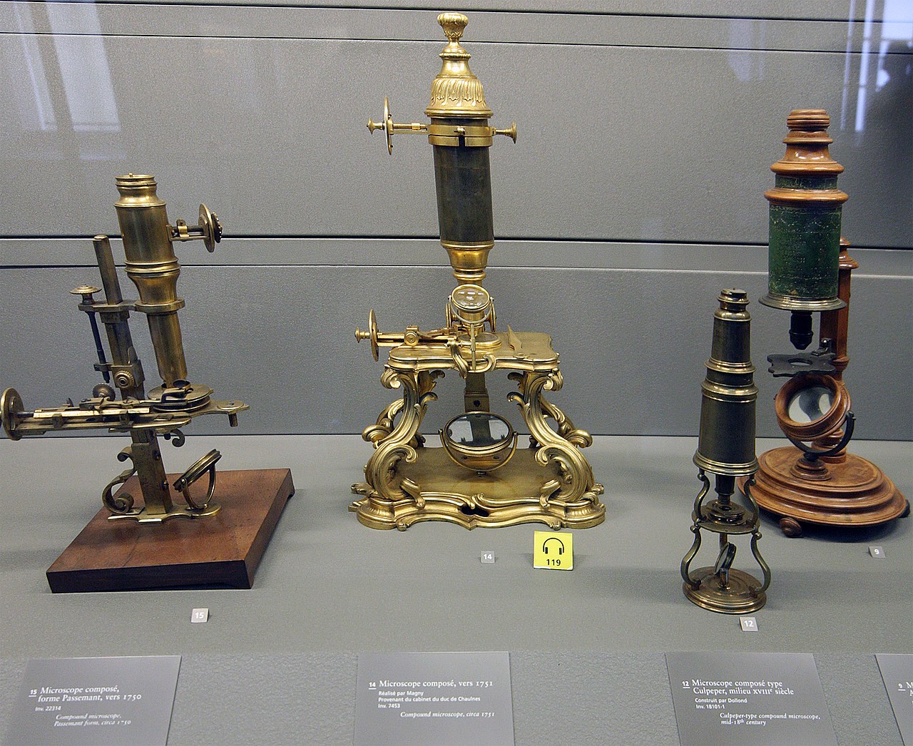 Fancy old microscopes on display at a museum in Paris.